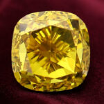 0.28 CT Natural Cushion Diamond Enhanced Orange Color Clarity VS1 (3.47 MM)